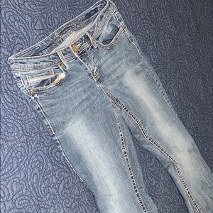 Seven size 8 slim boot cut dark washed jeans.